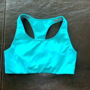 Nike women’s sports bra. Size S, gorgeous coral blue/green color, gently worn